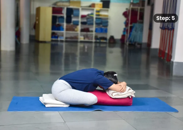 Adhomukha Swastikasana(step 6)
